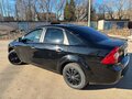 2011 Ford Focus II Рестайлинг, чёрный, 659999 рублей - вид 5