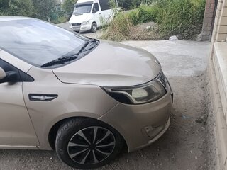 2015 Kia Rio III Рестайлинг, бежевый, 550000 рублей, вид 5