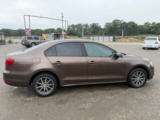 2011 Volkswagen Jetta VI, коричневый, 900000 рублей, вид 2