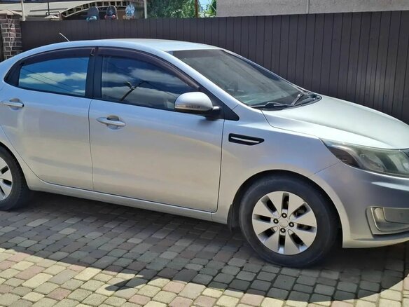 2011 Kia Rio 4-speed III, серебристый - вид 1