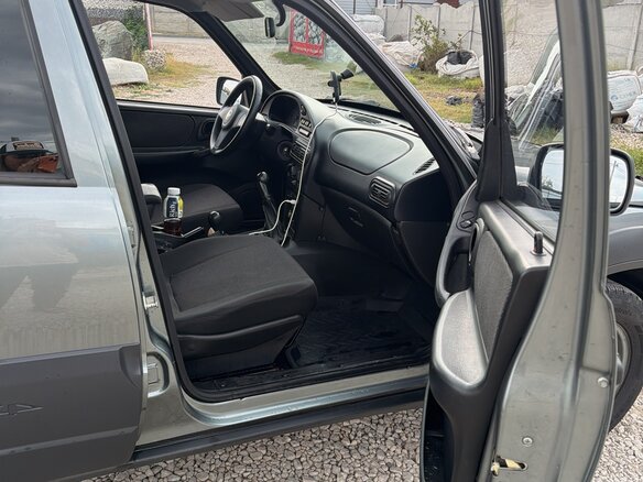 2012 Chevrolet Niva I Рестайлинг, серый, 560000 рублей - вид 7