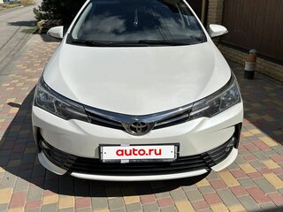 2016 Toyota Corolla XI (E160, E170, E180) Рестайлинг 1, белый, 1650000 рублей, вид 3