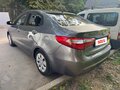 2013 Kia Rio 5-speed III, серый, 660000 рублей - вид 4