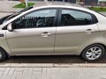 2014 Kia Rio 4-speed III, бежевый - вид 3