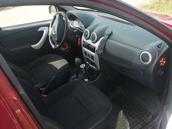 2012 Renault Sandero I, красный, 640000 рублей - вид 4