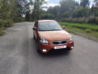 2011 Kia Rio II Рестайлинг, оранжевый, 600000 рублей, вид 2
