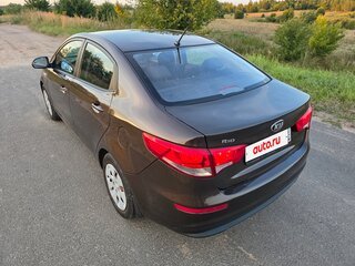 2015 Kia Rio III Рестайлинг, коричневый, 620000 рублей, вид 2