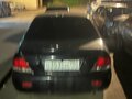 2007 Mitsubishi Lancer IX Рестайлинг, чёрный, 255000 рублей - вид 2
