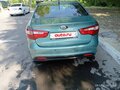 2013 Kia Rio 4-speed III, зелёный, 668000 рублей - вид 4