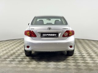 2010 Toyota Corolla X (E140, E150), серебристый, 899000 рублей, вид 4