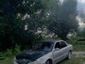 2000 Kia Clarus II, серебристый, 80000 рублей - вид 1