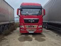 2011 MAN TGX, красный, 2500000 рублей - вид 10