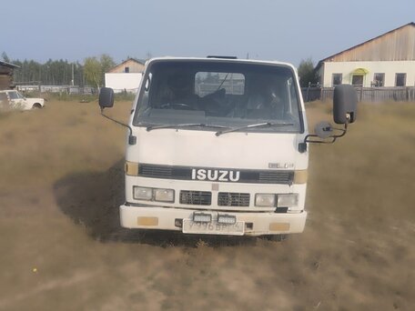 1988 Isuzu Elf (N-series), белый, 300000 рублей, вид 1