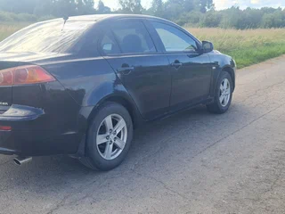 2009 Mitsubishi Lancer X, чёрный, 510000 рублей, вид 2