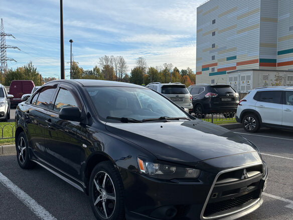 2012 Mitsubishi Lancer X Рестайлинг, чёрный, 750000 рублей - вид 1
