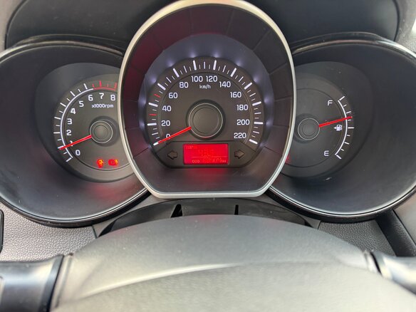 2014 Kia Rio 6-speed III, коричневый, 850000 рублей - вид 8