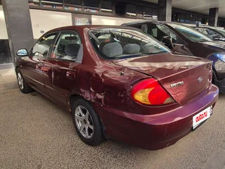 2006 Kia Spectra I Рестайлинг 2, красный, 133000 рублей, вид 4