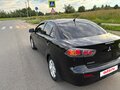 2010 Mitsubishi Lancer X, чёрный, 720000 рублей - вид 4