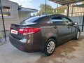 2014 Kia Rio III, коричневый - вид 3