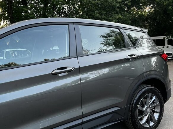 2026 Geely Binyue I Рестайлинг 2, серый - вид 3