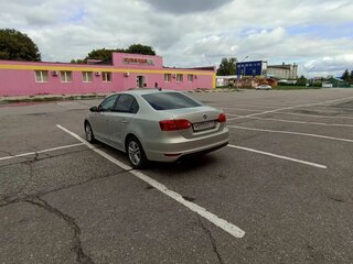 2014 Volkswagen Jetta VI Рестайлинг, серебристый, 930000 рублей, вид 5