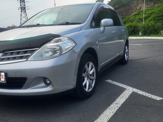 2009 Nissan Tiida Latio I, серебристый, 625000 рублей, вид 1