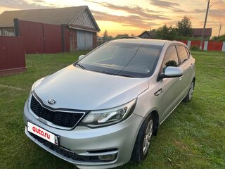 2015 Kia Rio 6-speed III, серебристый, 750000 рублей, вид 1