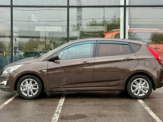 2015 Hyundai Solaris I Рестайлинг, коричневый, 736000 рублей, вид 4