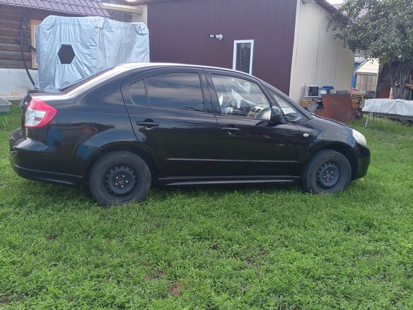 2011 Suzuki SX4 I (Classic) Рестайлинг, чёрный, 600000 рублей - вид 3