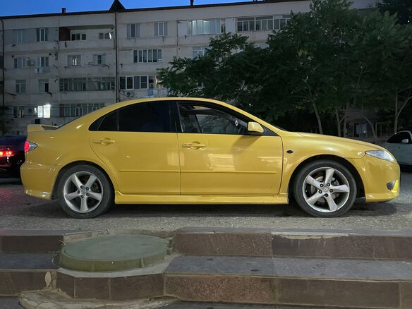 2003 Mazda 6 I (GG), жёлтый, 365000 рублей - вид 2