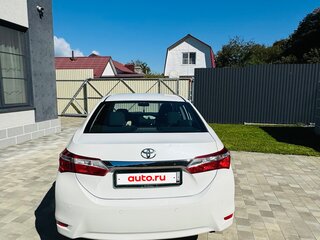 2014 Toyota Corolla XI (E160, E170, E180), белый, 1250000 рублей, вид 4