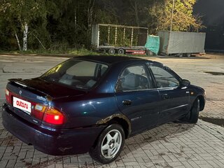 1996 Mazda 323 V (BA), зелёный, 70000 рублей, вид 3