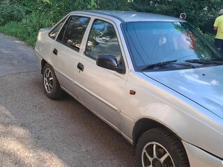 2010 Daewoo Nexia I Рестайлинг, серебристый, 80000 рублей, вид 1