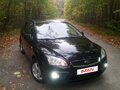 2006 Ford Focus II, чёрный - вид 2