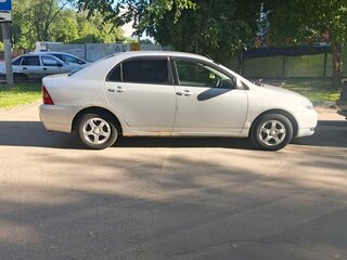 2001 Toyota Corolla IX (E120, E130), серебристый, 390000 рублей, вид 2