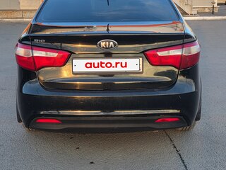 2013 Kia Rio 4-speed III, чёрный, 725000 рублей, вид 3