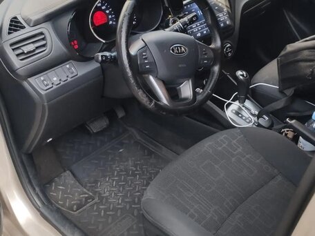 2012 Kia Rio 4-speed III, бежевый, вид 5