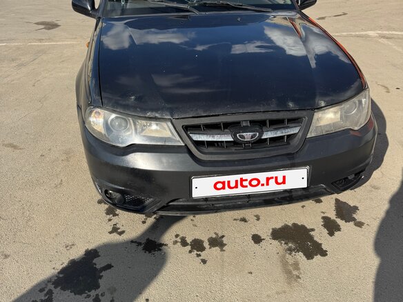 2011 Daewoo Nexia I Рестайлинг, чёрный - вид 1