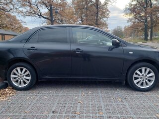 2008 Toyota Corolla X (E140, E150), чёрный, 735000 рублей, вид 3