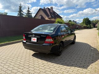 2003 Toyota Corolla IX (E120, E130), чёрный, 450000 рублей, вид 5