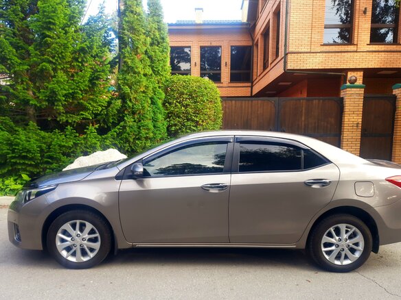 2014 Toyota Corolla XI (E160, E170, E180), золотистый, 1800000 рублей - вид 15