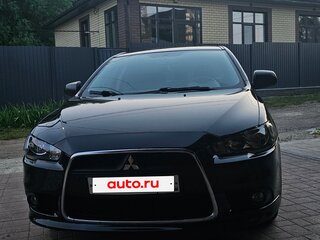 2011 Mitsubishi Lancer X Рестайлинг, чёрный, 910000 рублей, вид 3