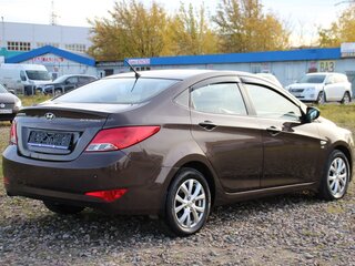 2014 Hyundai Solaris I Рестайлинг, коричневый, 949000 рублей, вид 5