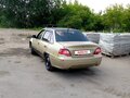 2010 Daewoo Nexia I Рестайлинг, золотистый, 75000 рублей - вид 2