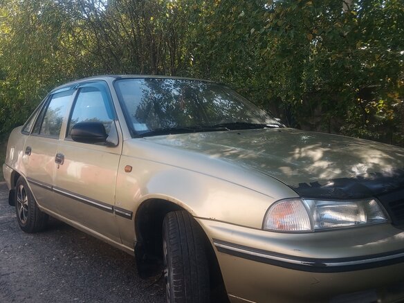 2004 Daewoo Nexia I, золотистый, 99000 рублей