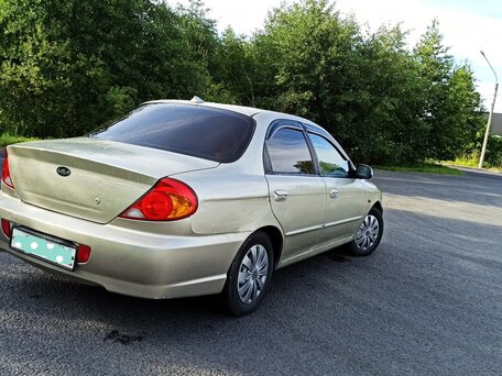 2007 Kia Spectra I Рестайлинг 2, золотистый, вид 1