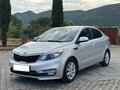 2016 Kia Rio III Рестайлинг, серебристый, 1183000 рублей - вид 4