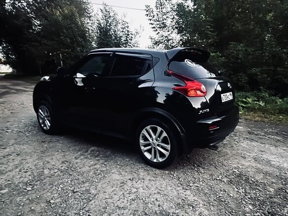 2011 Nissan Juke I, чёрный - вид 3