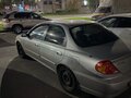 2006 Kia Spectra I Рестайлинг 2, серебристый, 300000 рублей - вид 1