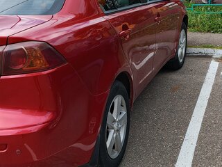 2008 Mitsubishi Lancer X, красный, 525000 рублей, вид 4